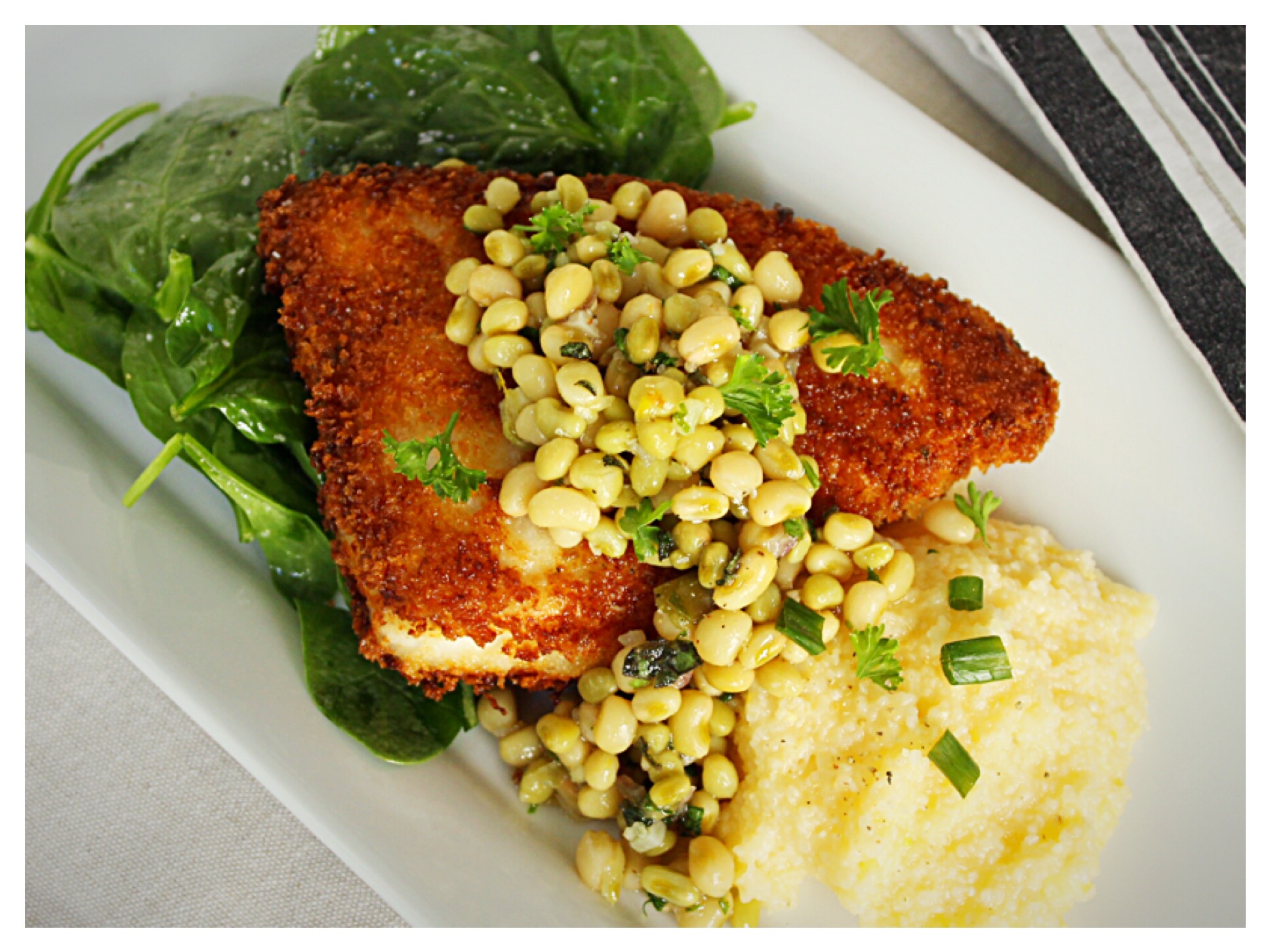 panko-encrusted-swordfish-and-lady-pea-relish-over-baby-spinach