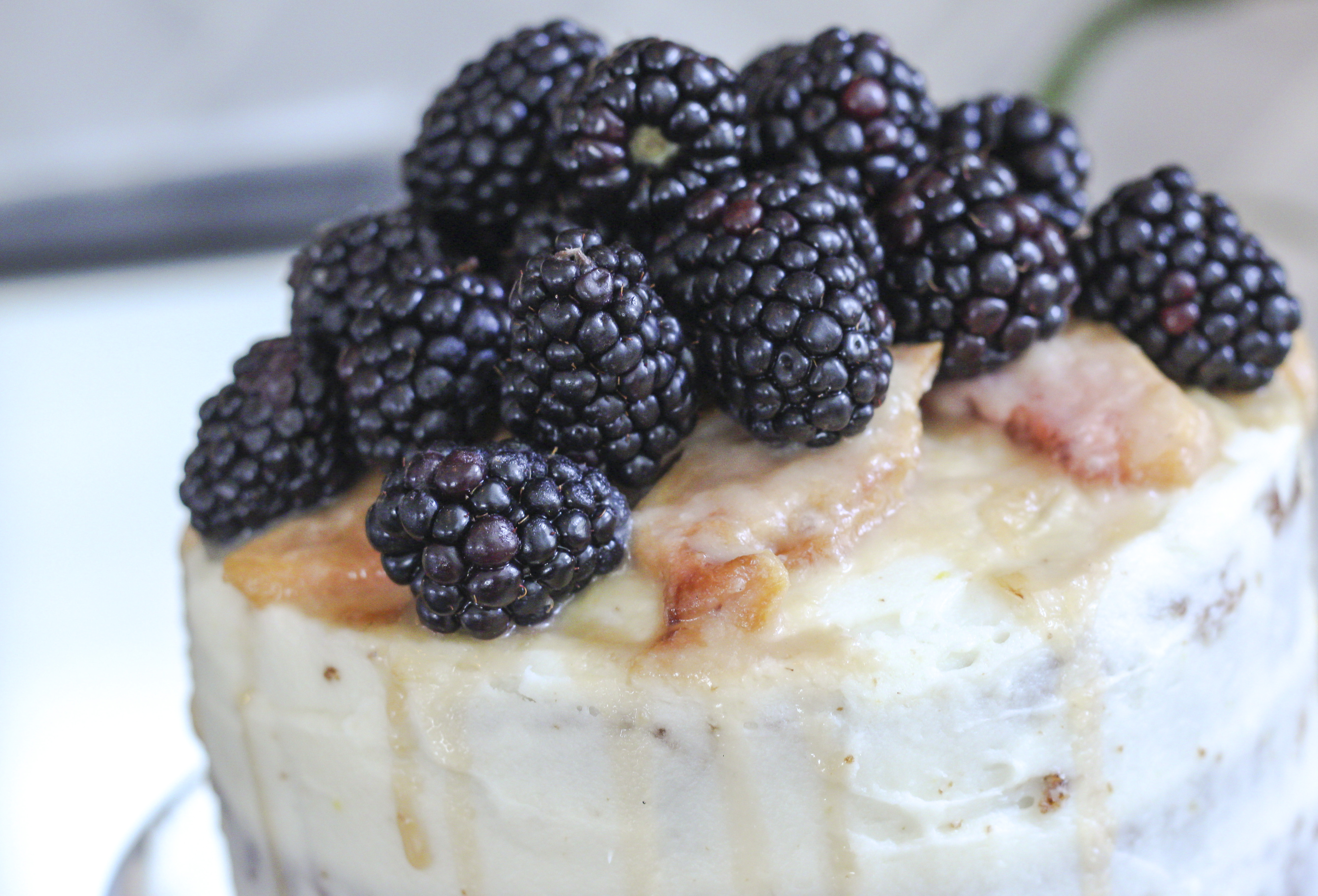 Peach Carrot Cake with Cream Cheese Frosting and Blackberry Garnish